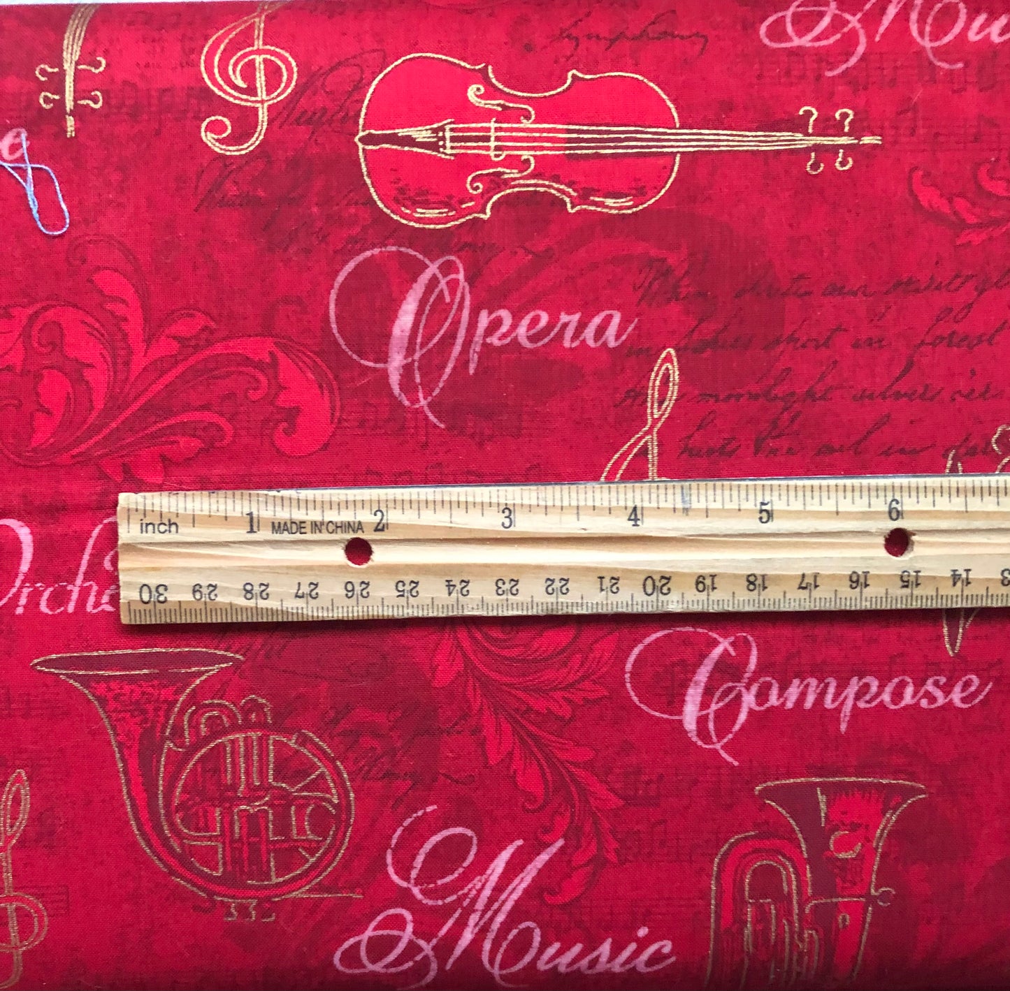Robert Kaufman Fabric Opera, Music, Tuba, and Violin Enhanced with Gold Metallic on Red, Designer Cotton, Quilting Fabric, Sold By YARD