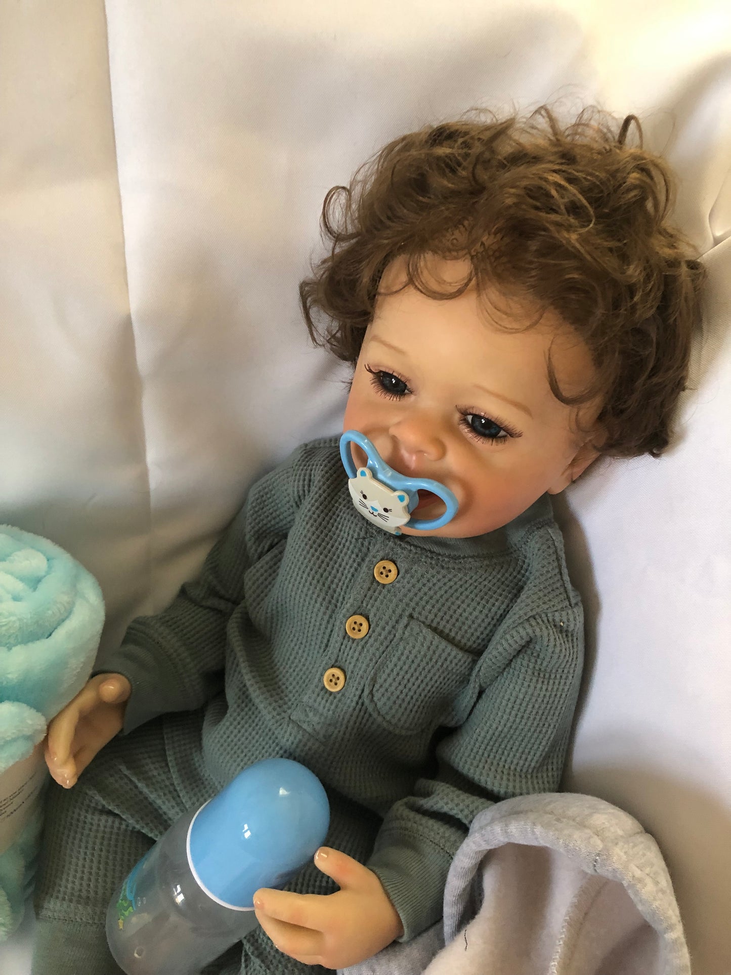 Adorable Reborn Boy Doll, Lifelike and Realistic, Outfits for Every Season and Plush Blanket