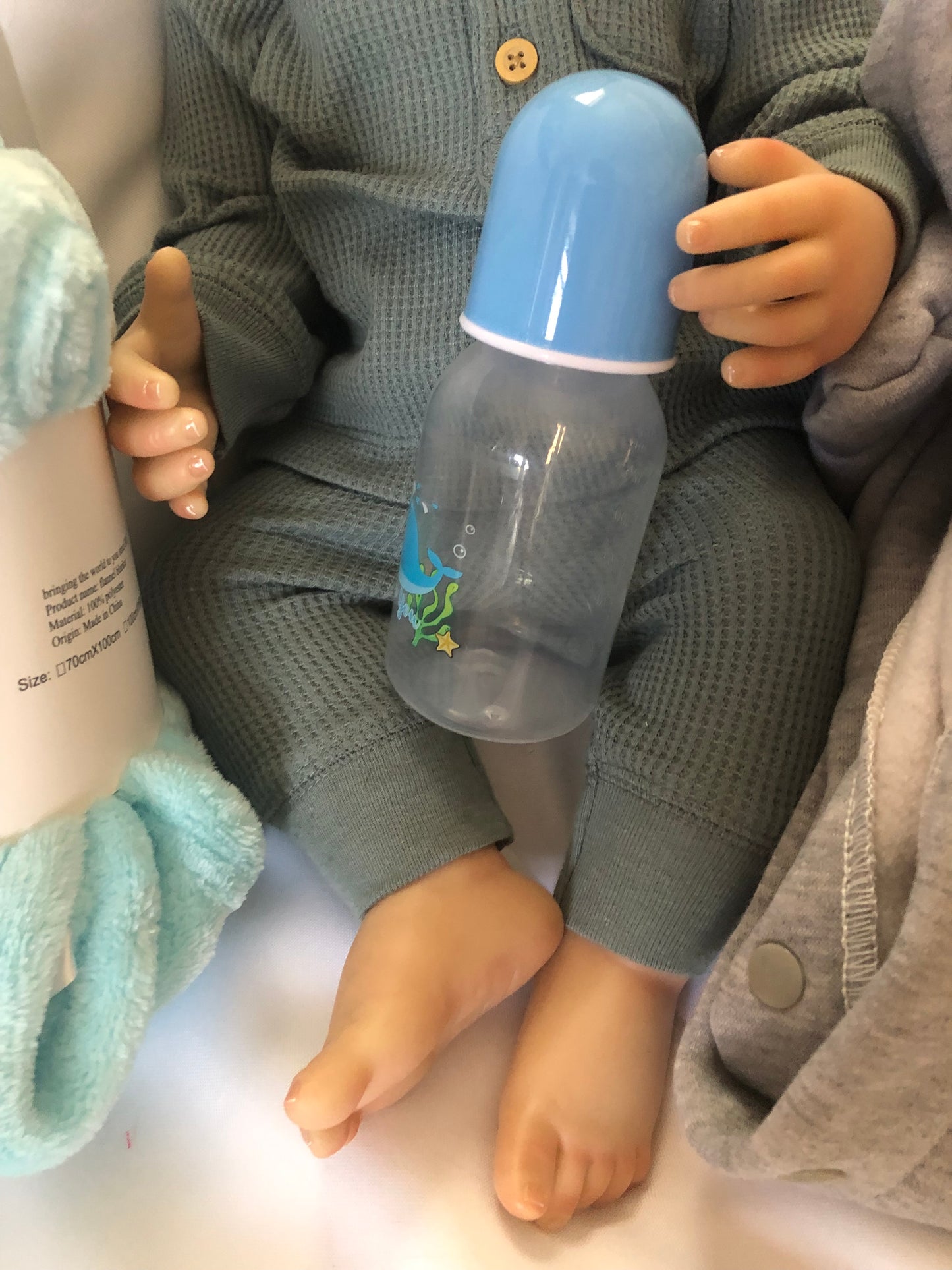 Adorable Reborn Boy Doll, Lifelike and Realistic, Outfits for Every Season and Plush Blanket