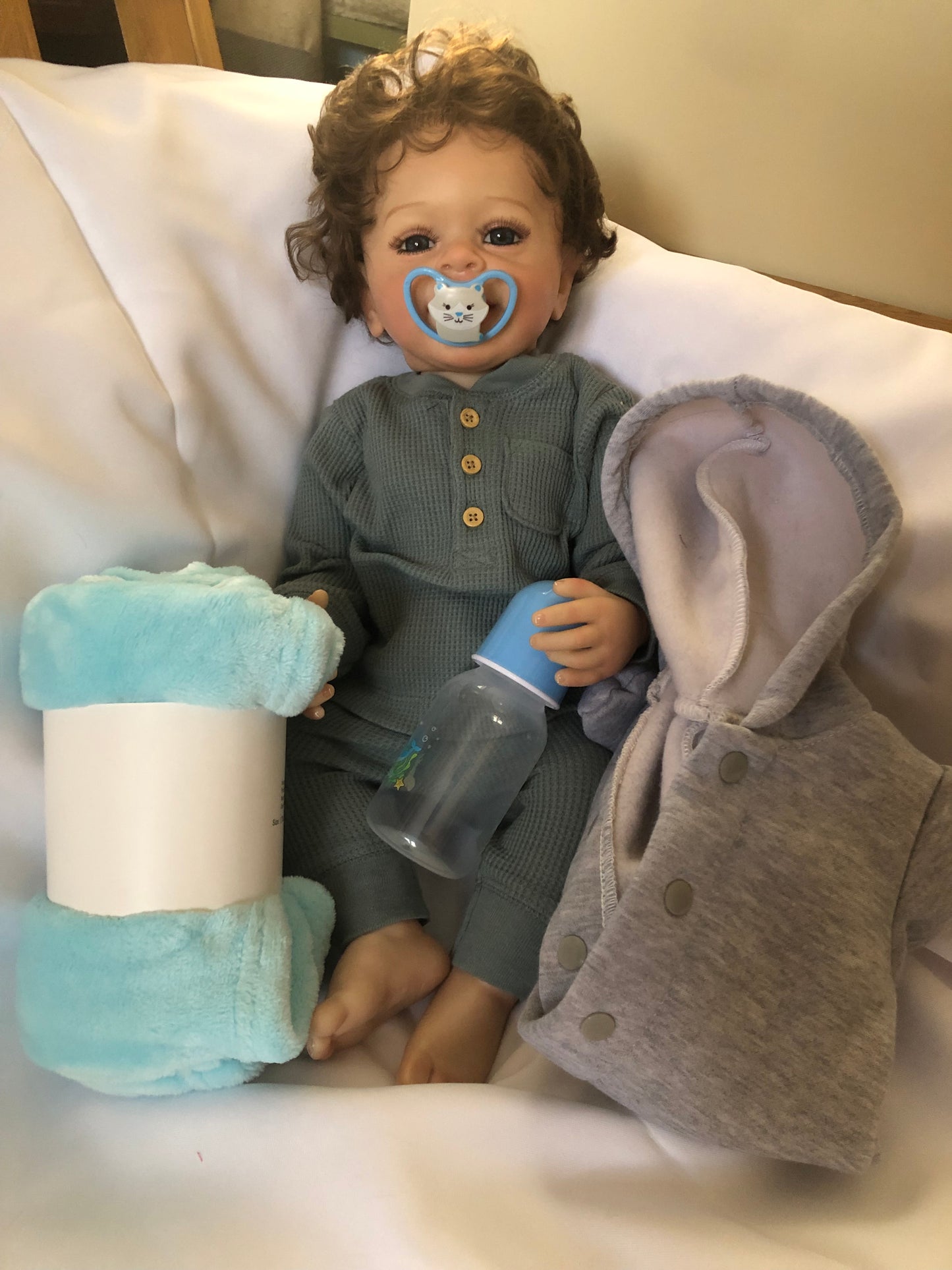 Adorable Reborn Boy Doll, Lifelike and Realistic, Outfits for Every Season and Plush Blanket